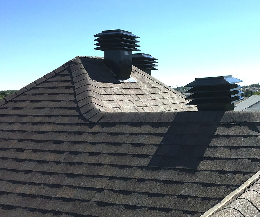 Professional roofing contractors in Toronto inspecting and maintaining a roof for long-lasting protection.